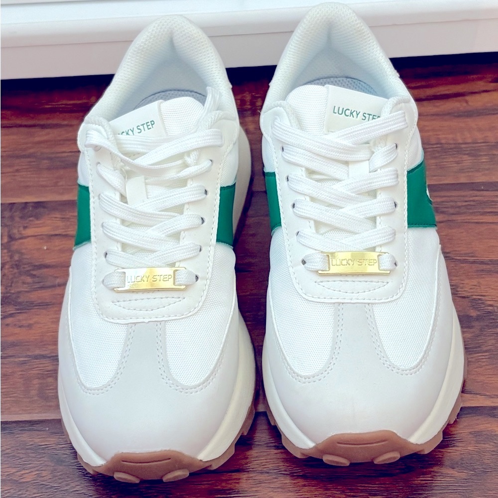 White fashion sneaker green with gum bottom